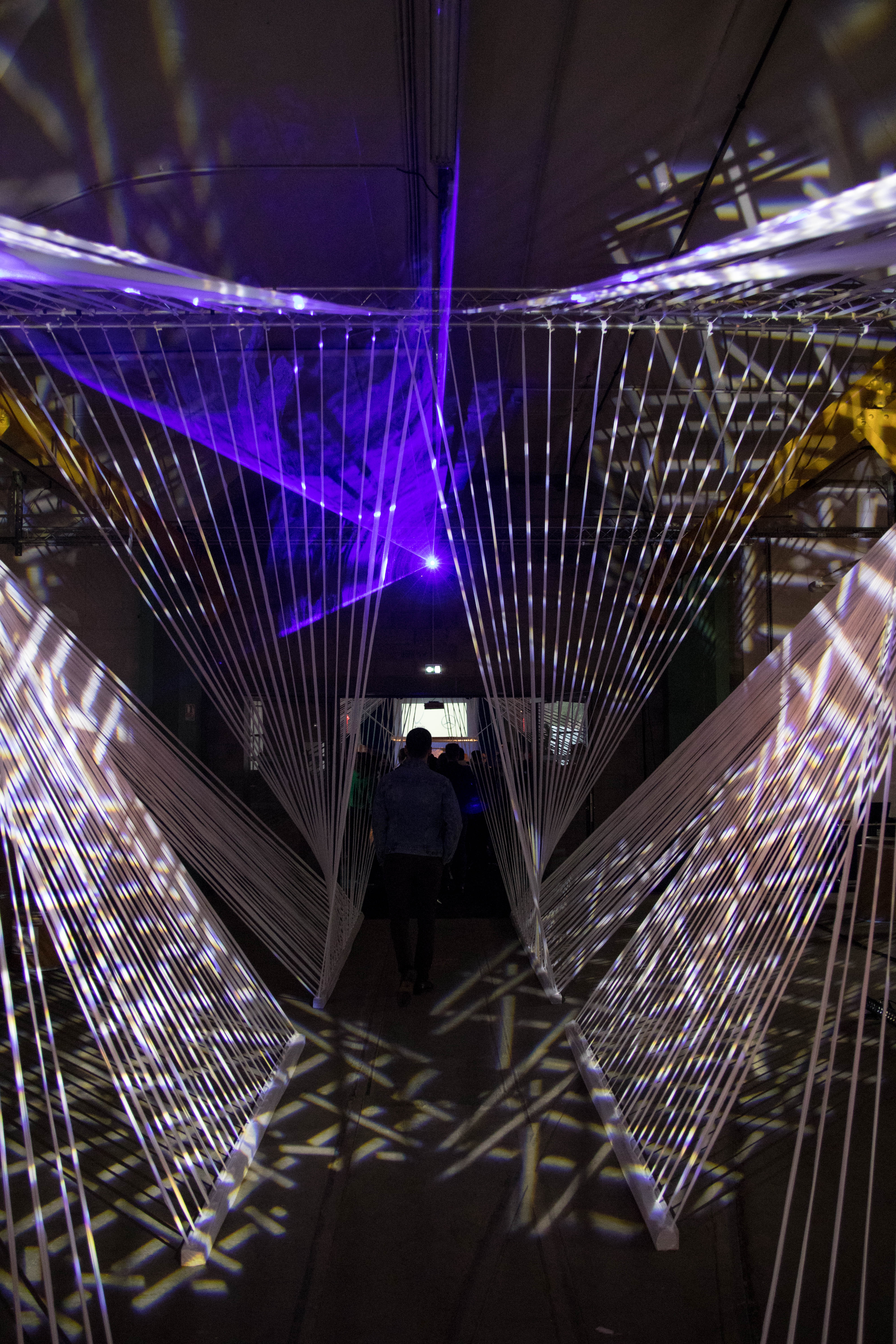 LED branding activation Antwerp outdoor waterfront scenography at dusk · INNOV'events