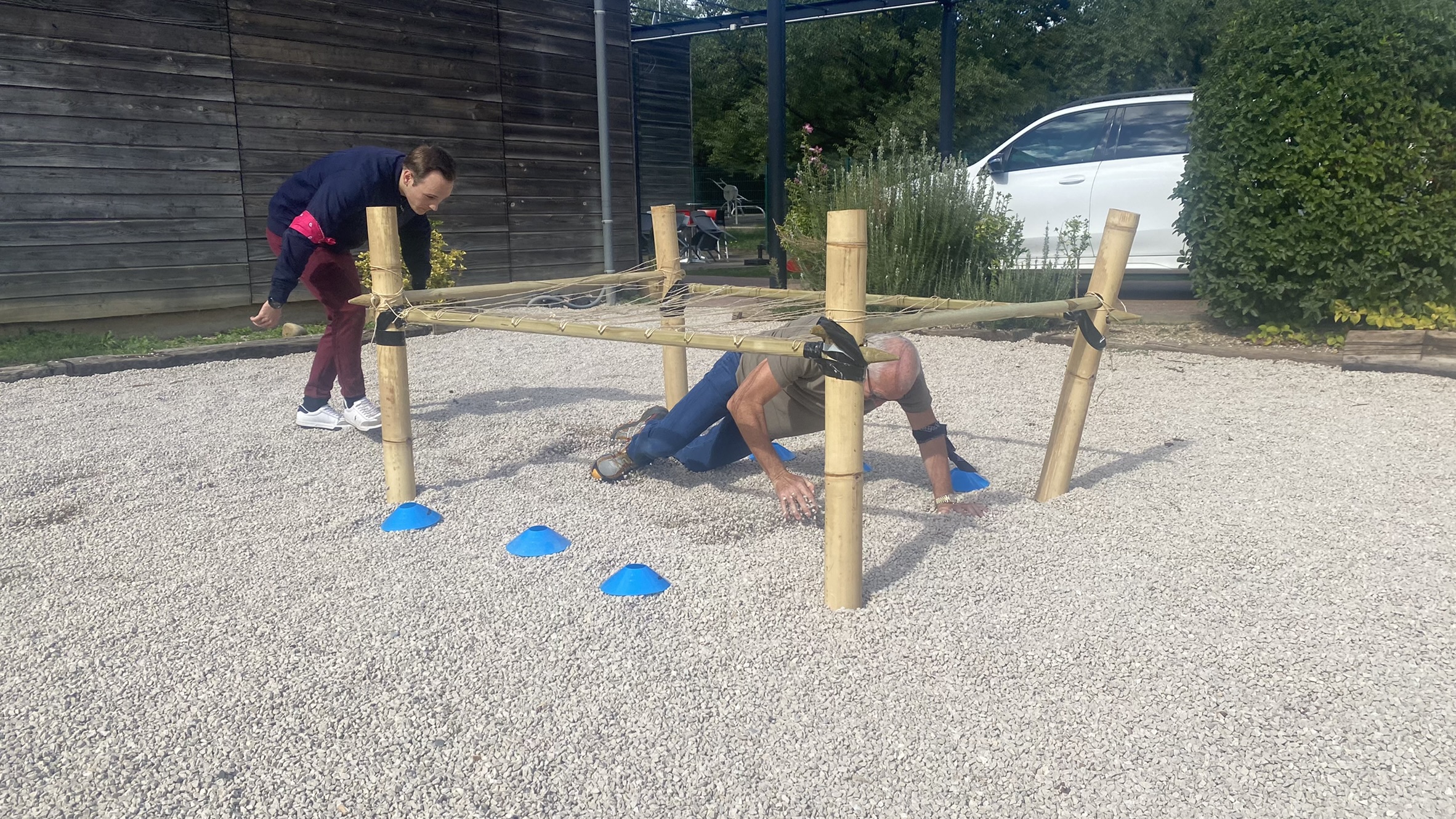 Outdoor challenge Antwerp Scheldt riverfront group teamwork activity · INNOV'events
