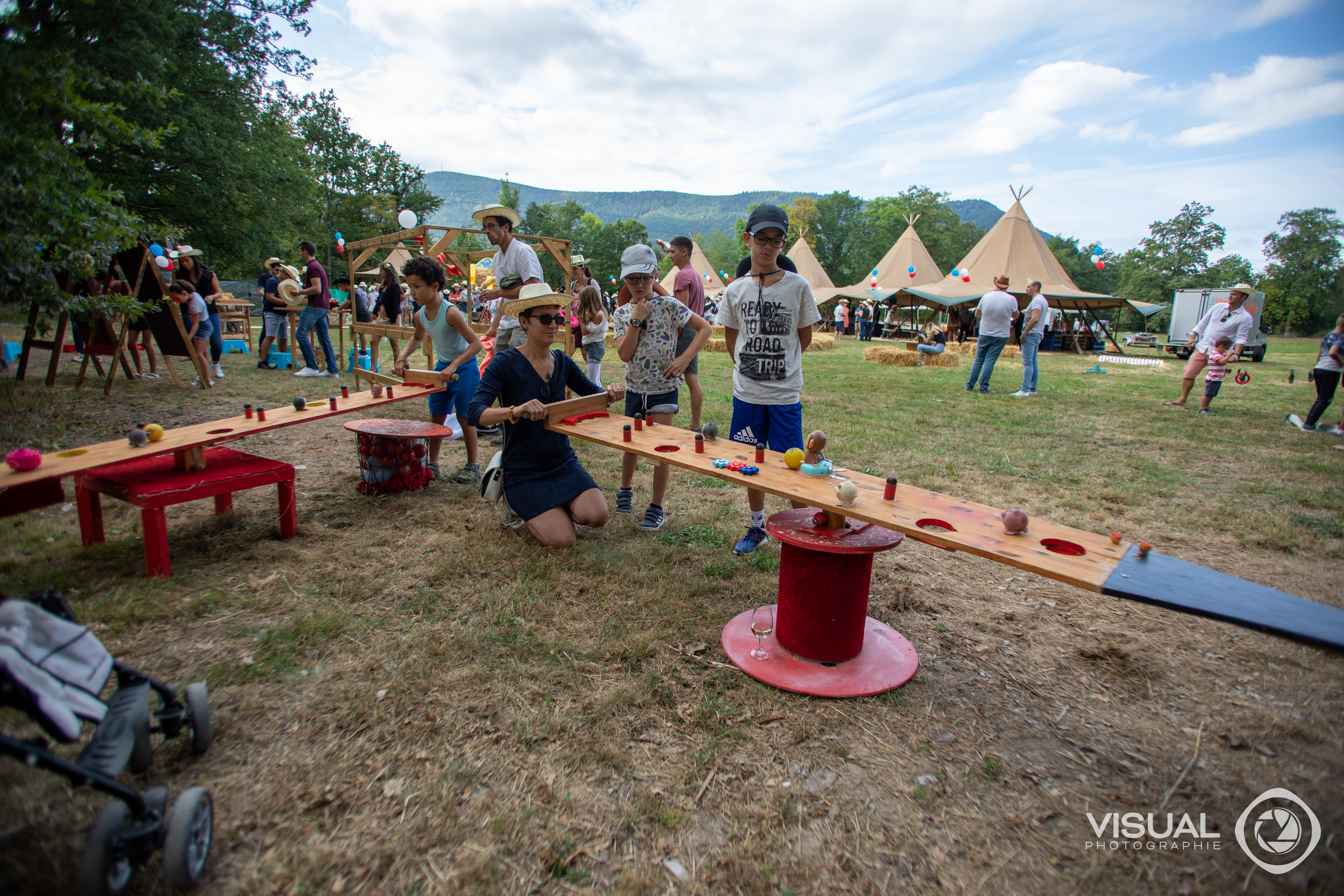 Reuzenspellen challenge Luik teams Parc de la Boverie spelmoment zonnige dag · INNOV'events