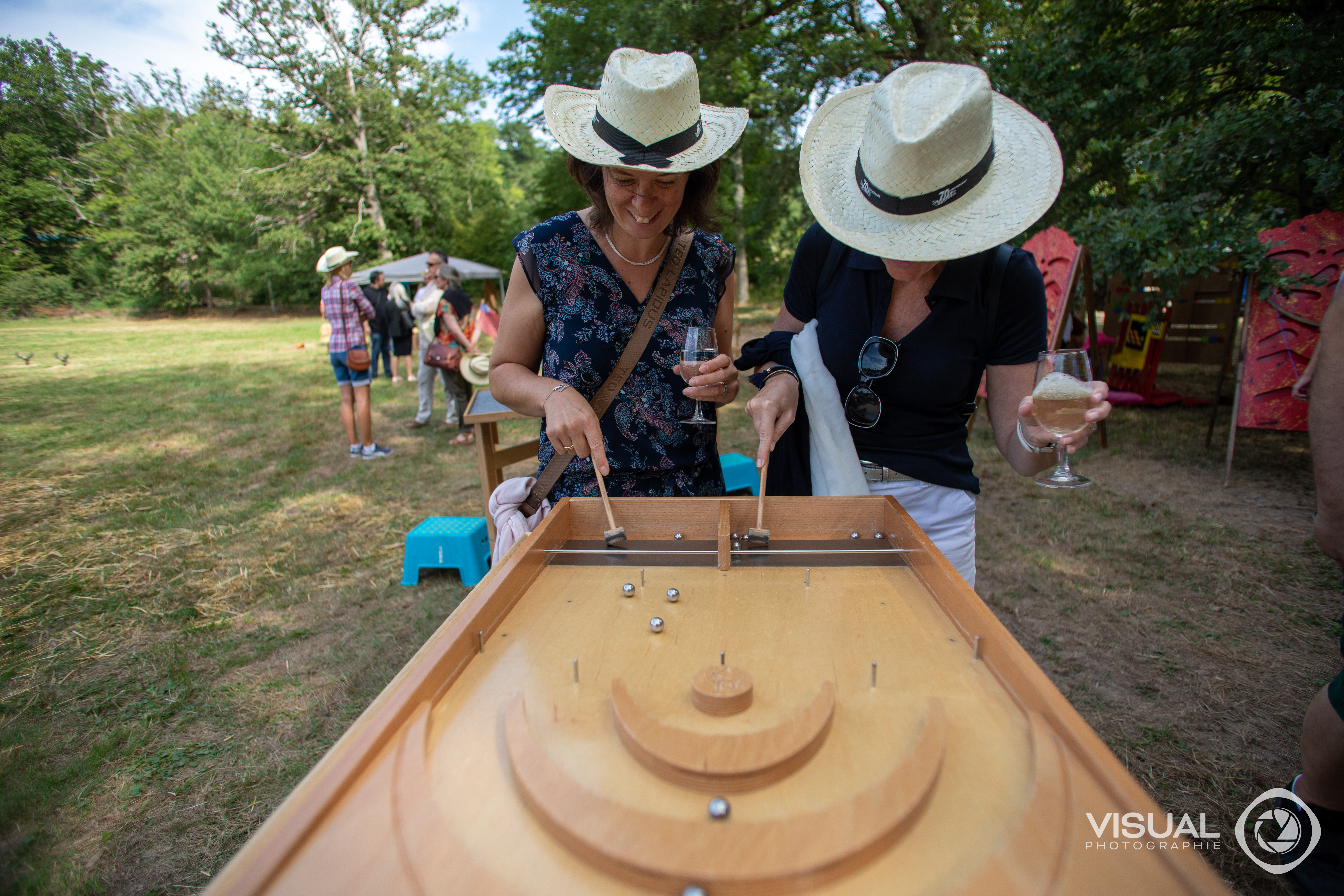 Inflatable games corporate summer party Belgium outdoor team activity · INNOV'events